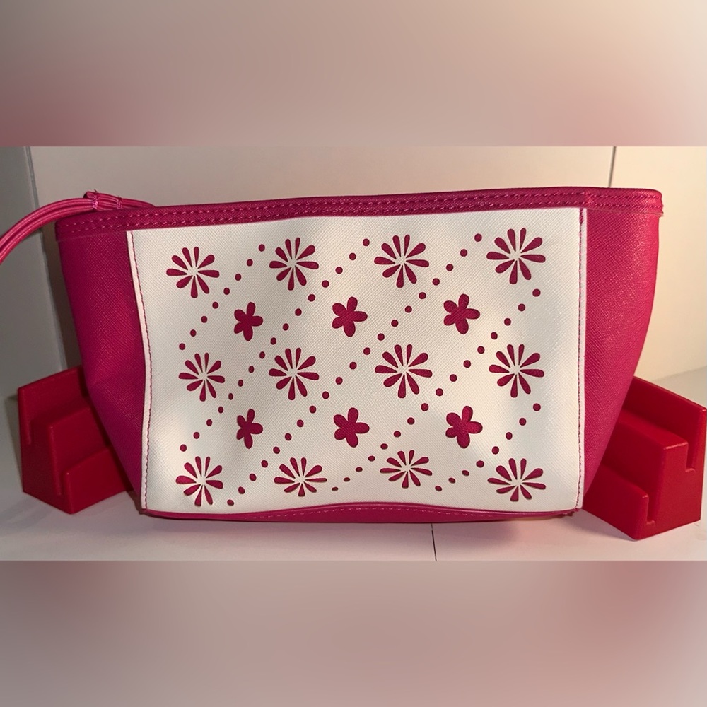 Vera Bradley Pink and White Laser Cut Floral Wristlet.